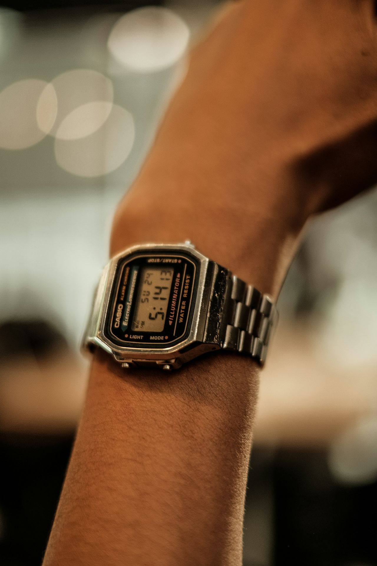 a close up of a person's wrist with a watch on it
